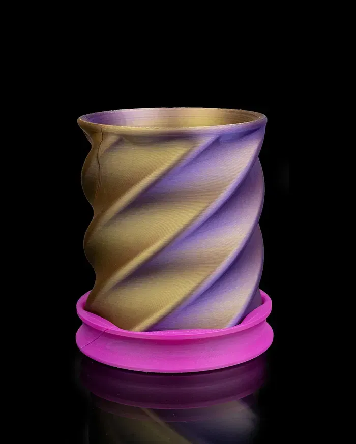 A pencil holder filled with pencils scissors and brushes