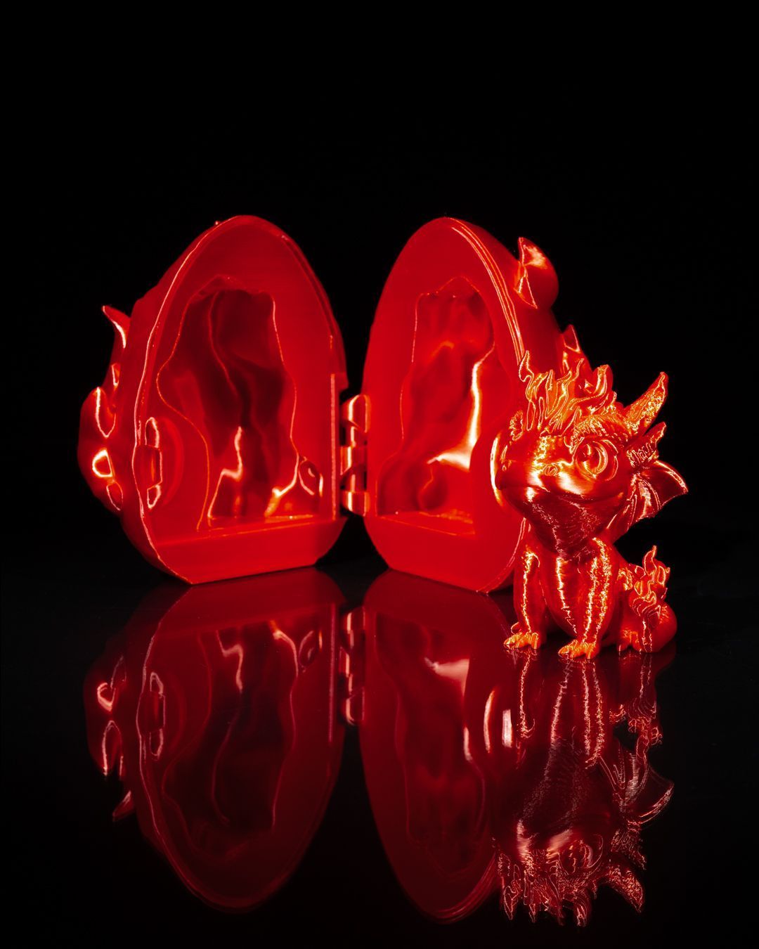 A red egg with a dragon inside of it