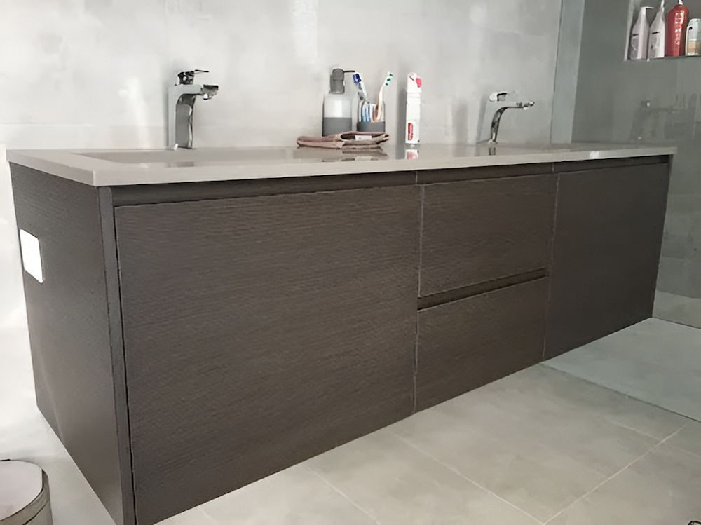A Bathroom Vanity With Two Sinks And Two Faucets — United Kitchens and Joinery in Oak Flats, NSW