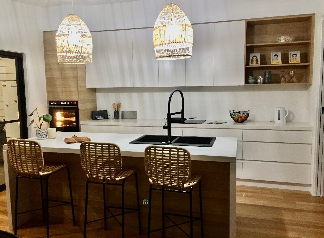 A Kitchen With White Cabinets, Stainless Steel Appliances — United Kitchens and Joinery in Albion Park, NSW