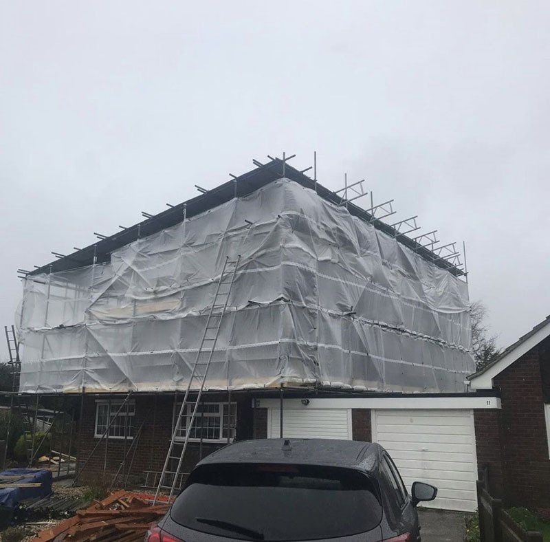 large house with scaffold with  a garden 1