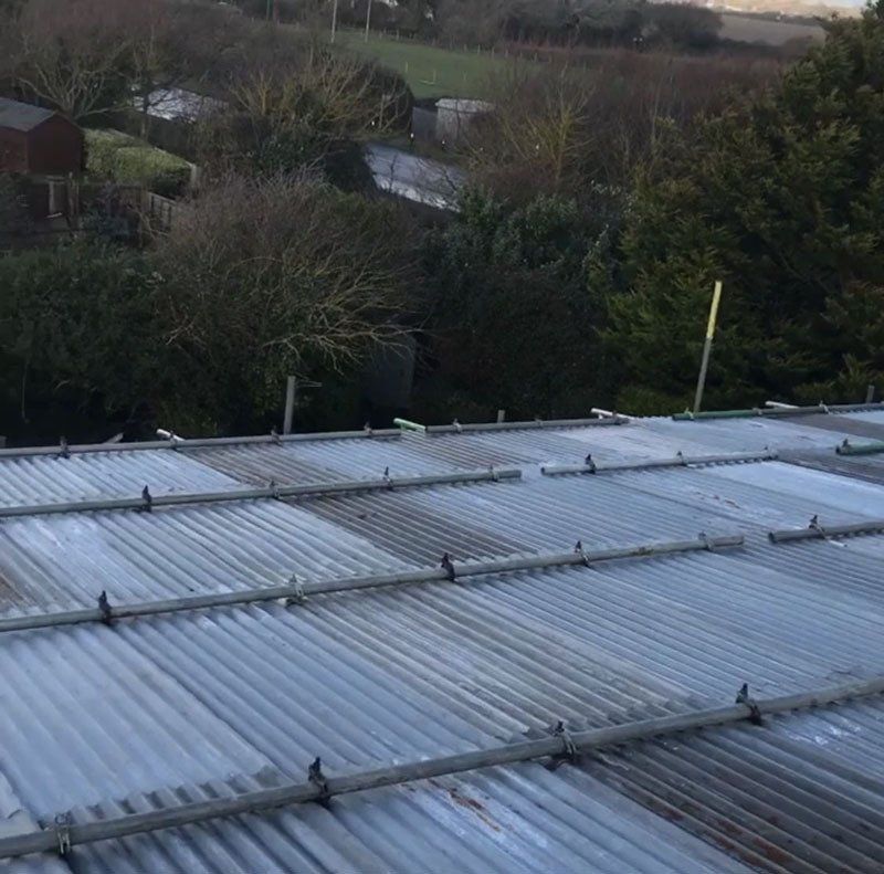 large house with scaffold with  a garden 8