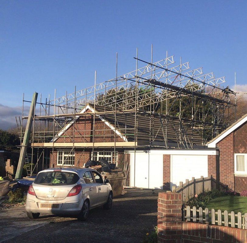large house with scaffold with  a garden 4