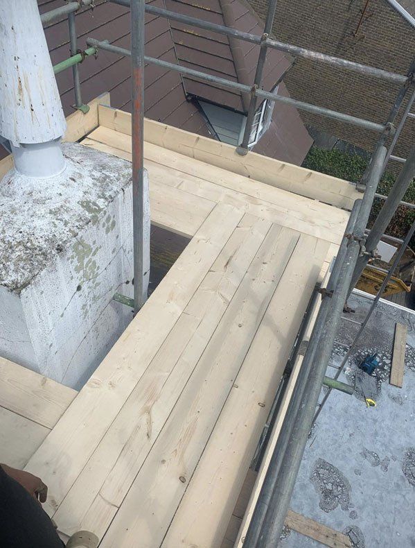 large house with scaffold with  a garden 6