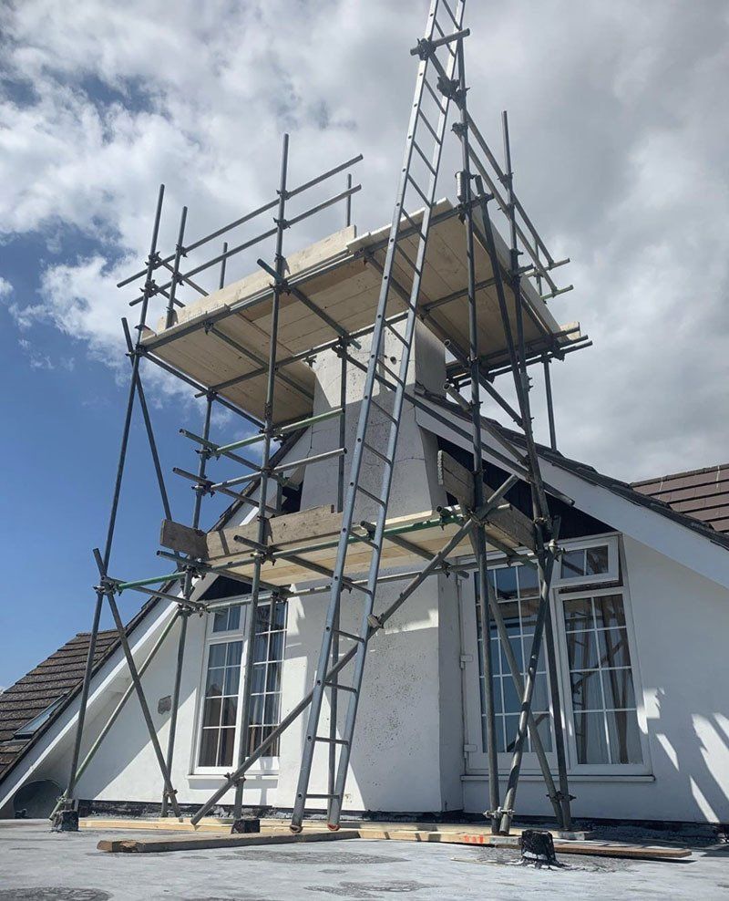 large house with scaffold with  a garden 7