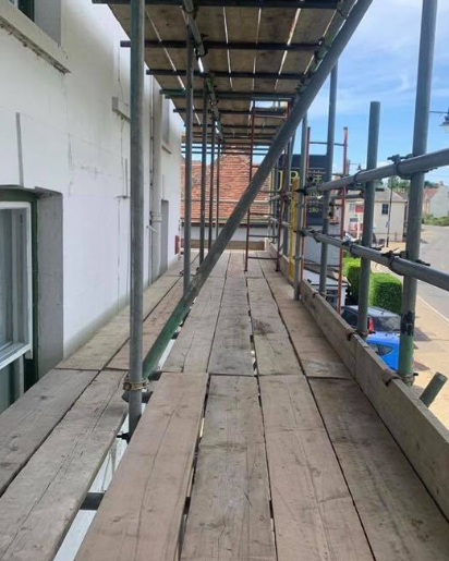 town house with scaffold