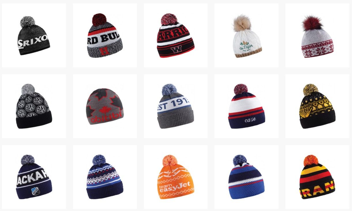 Fifteen knit winter hats with different colors, patterns, and pom-poms. Some have logos.