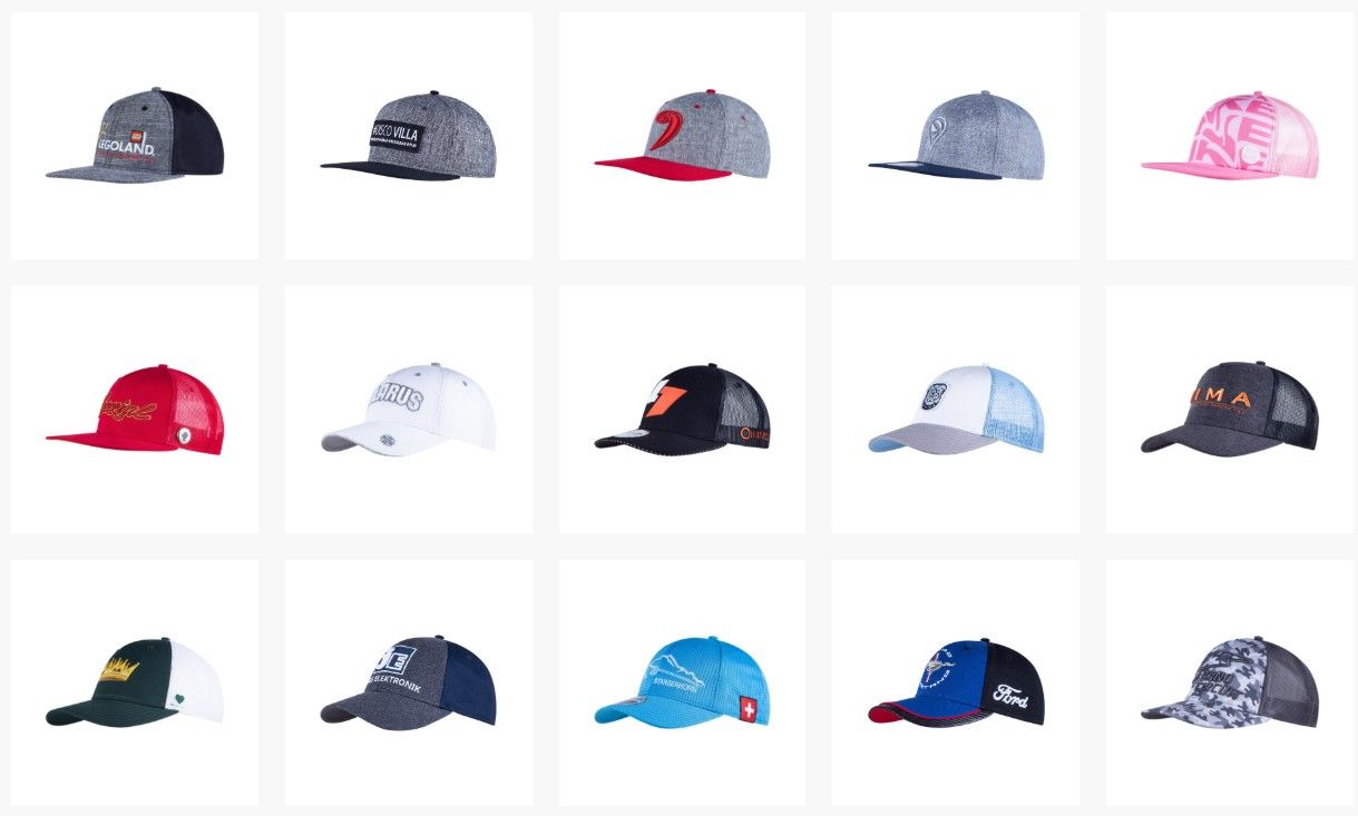Rows of colorful baseball caps on a white background, varying designs, colors and logos.