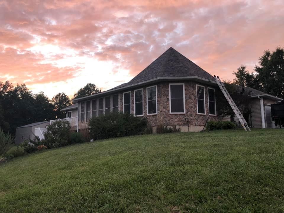 A large house with a large window on the top of it