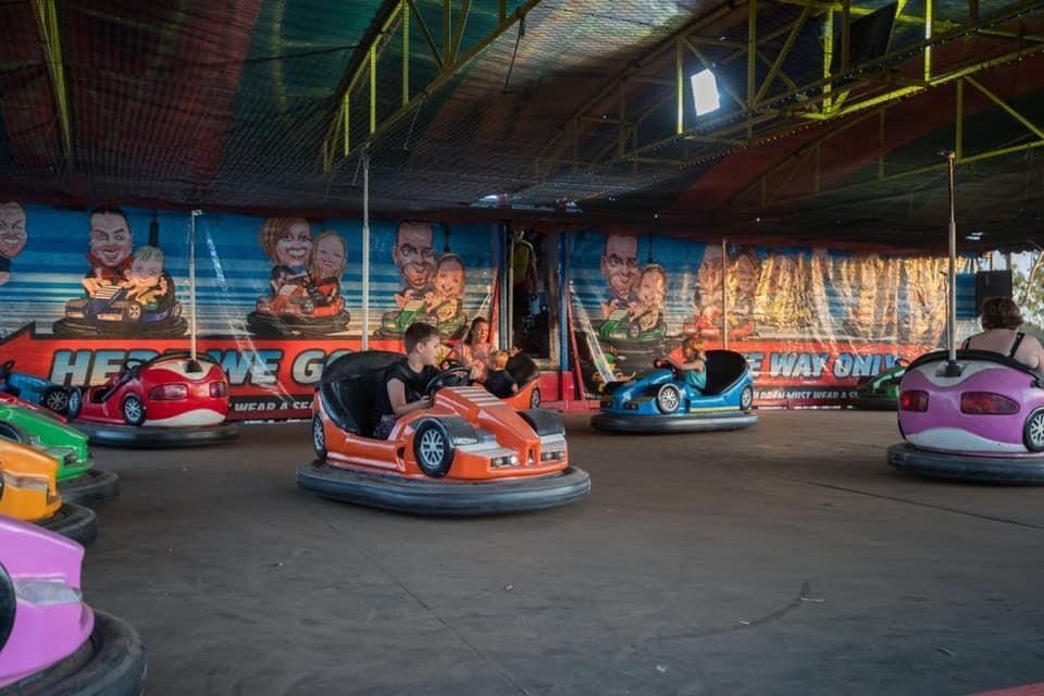 A Young Boy is Standing in Front of an Inflatable Cars Slide — Fun Time Amusements in Gracemere, QLD