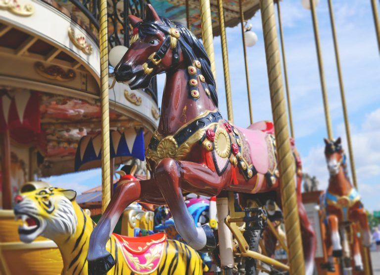 A Merry Go Round With Horses and Tigers on It — Fun Time Amusements in Gracemere, QLD