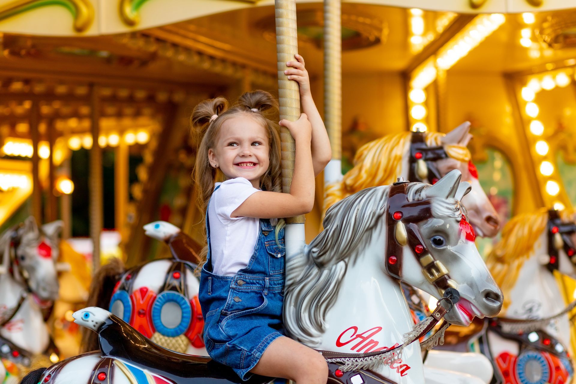 A Little Girl is Jumping in a Bouncy House — Fun Time Amusements in Gracemere, QLD