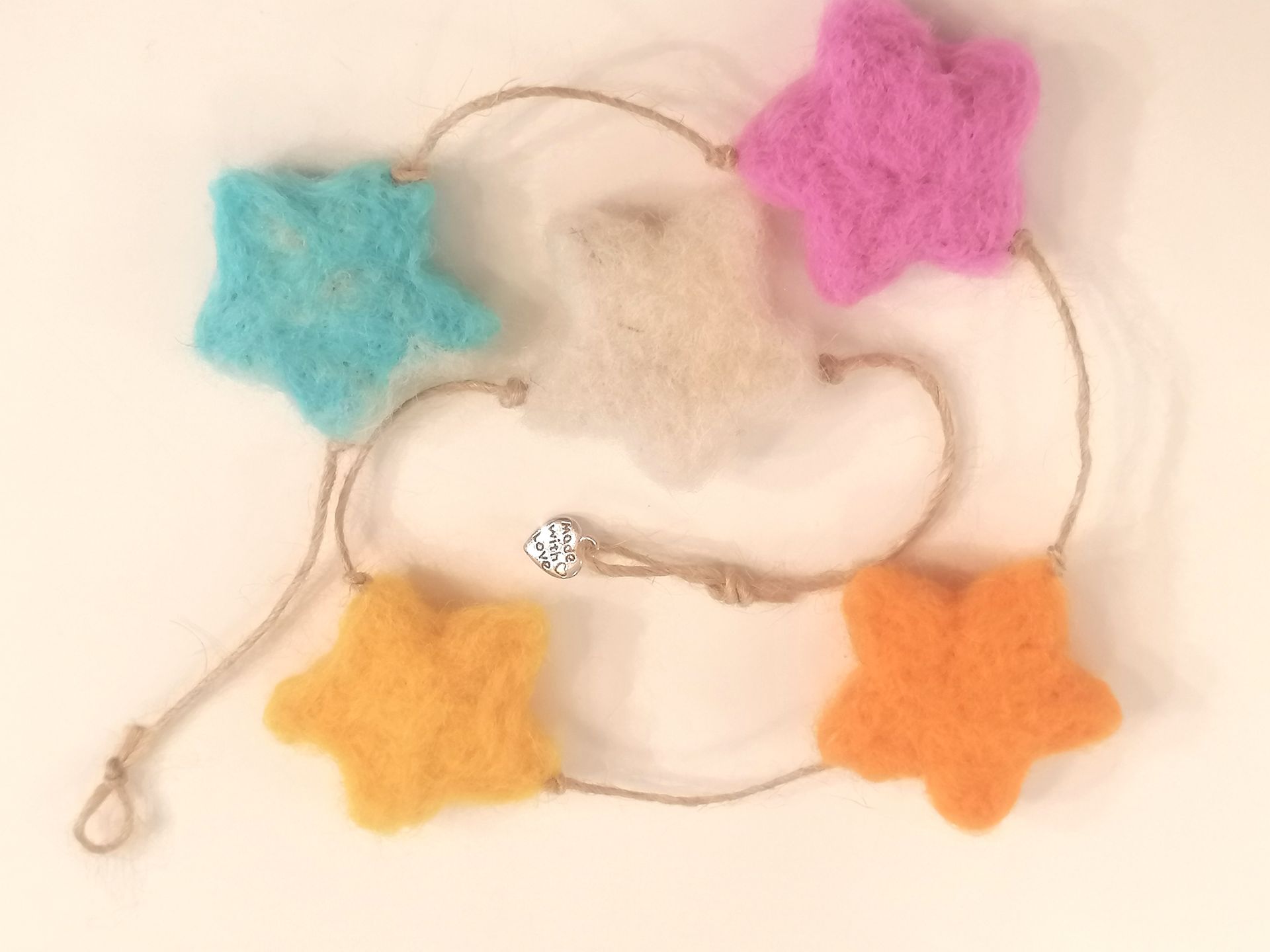 wol, slinger, touw, bedeltje, ster, sterren, versiering, decoratie, verjaardag, feest,