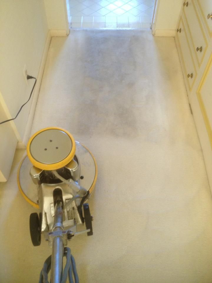 Carpet Master of Tulsa - A machine is sitting on the floor in a hallway