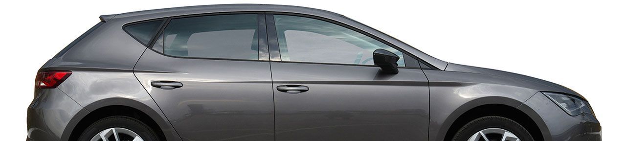 Gray hatchback car in side profile, isolated on a white background