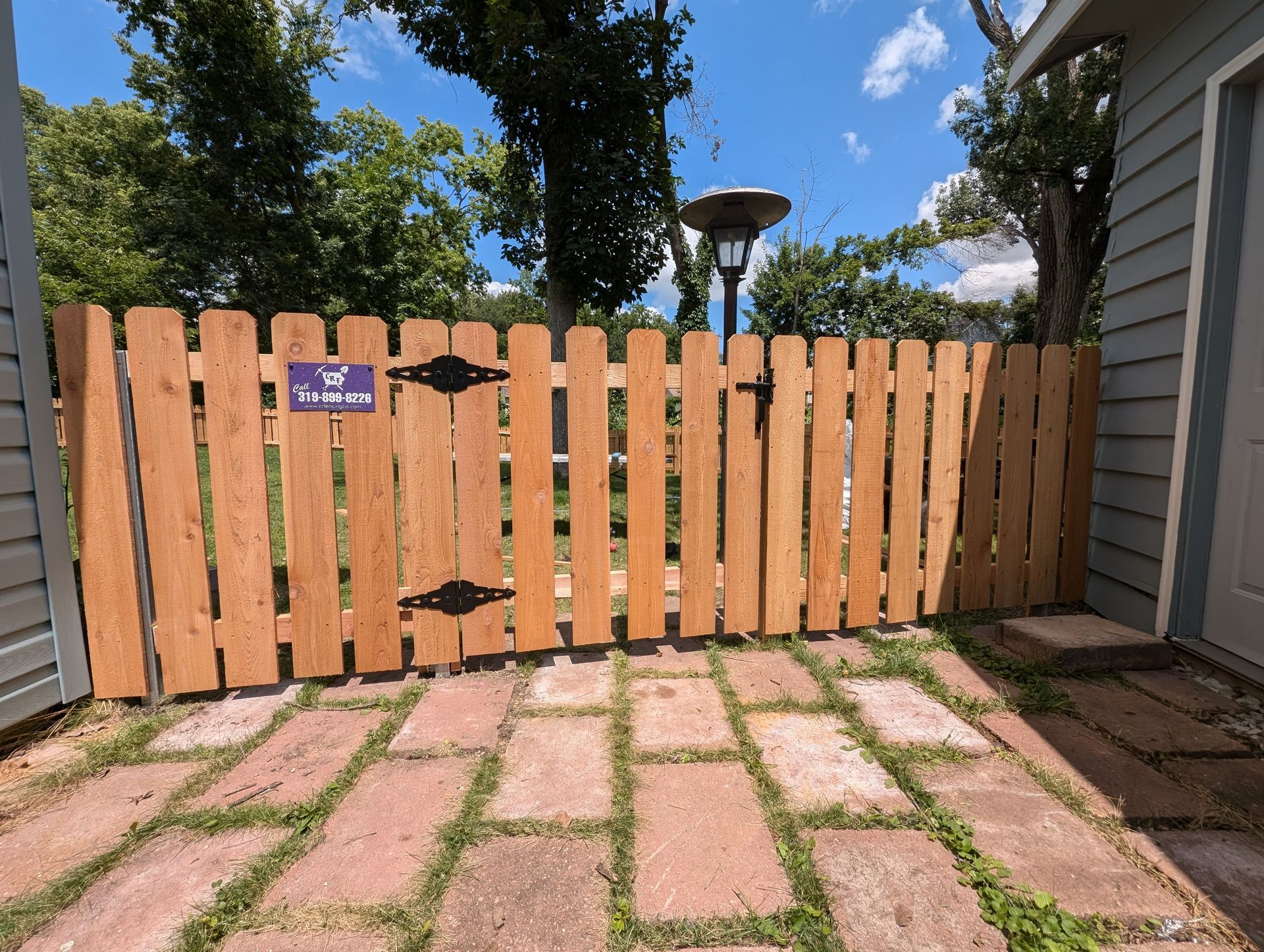 Flower Garden Wood Fence — Cedar Rapids, Iowa — Corridor Residential Fencing Co.