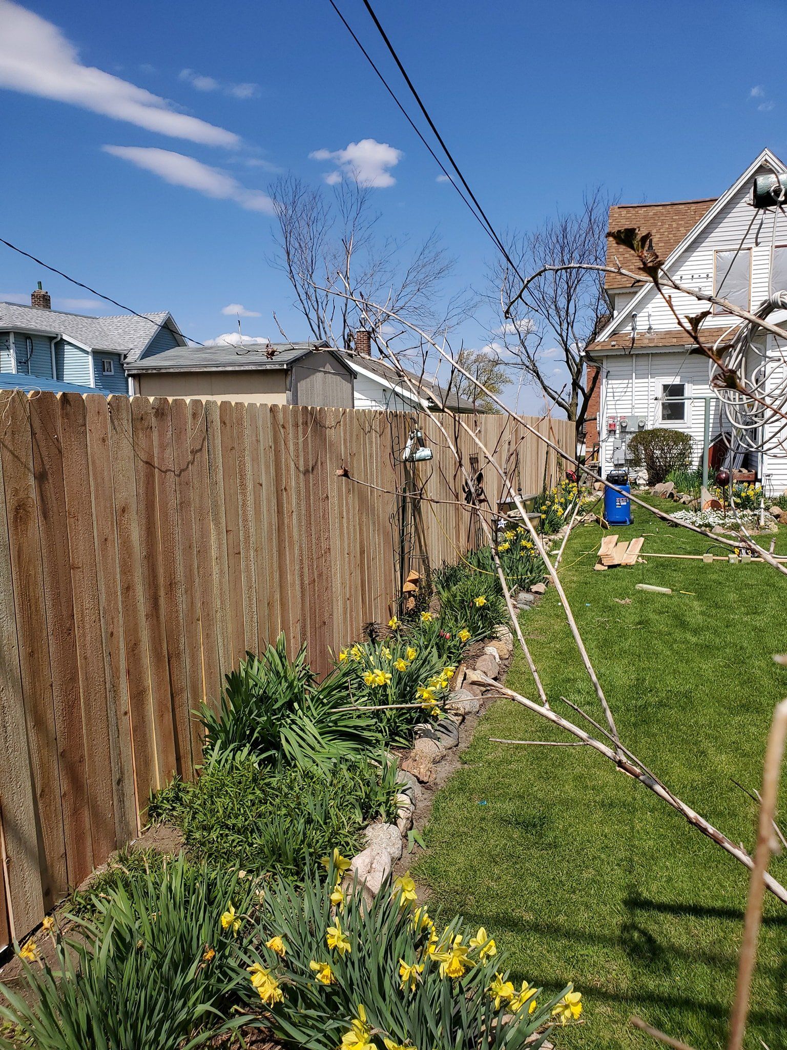 Flower Garden Wood Fence — Cedar Rapids, Iowa — Corridor Residential Fencing Co.