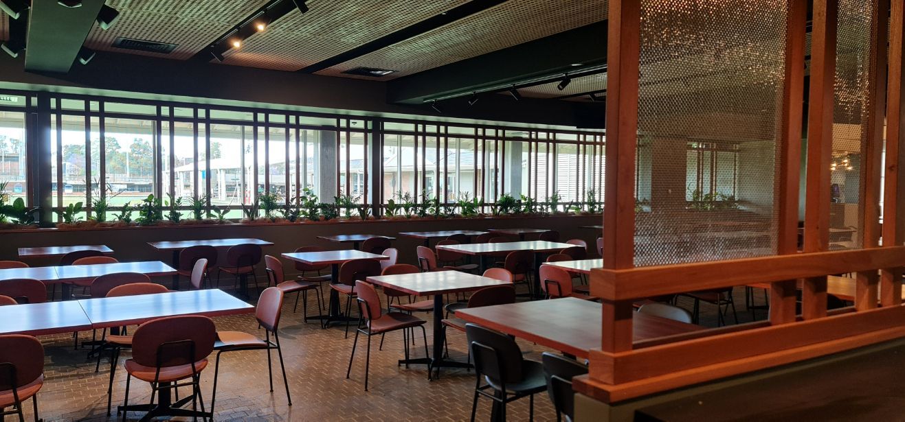 There Are Many Tables And Chairs In The Restaurant — Logic Joinery In Fountaindale, NSW