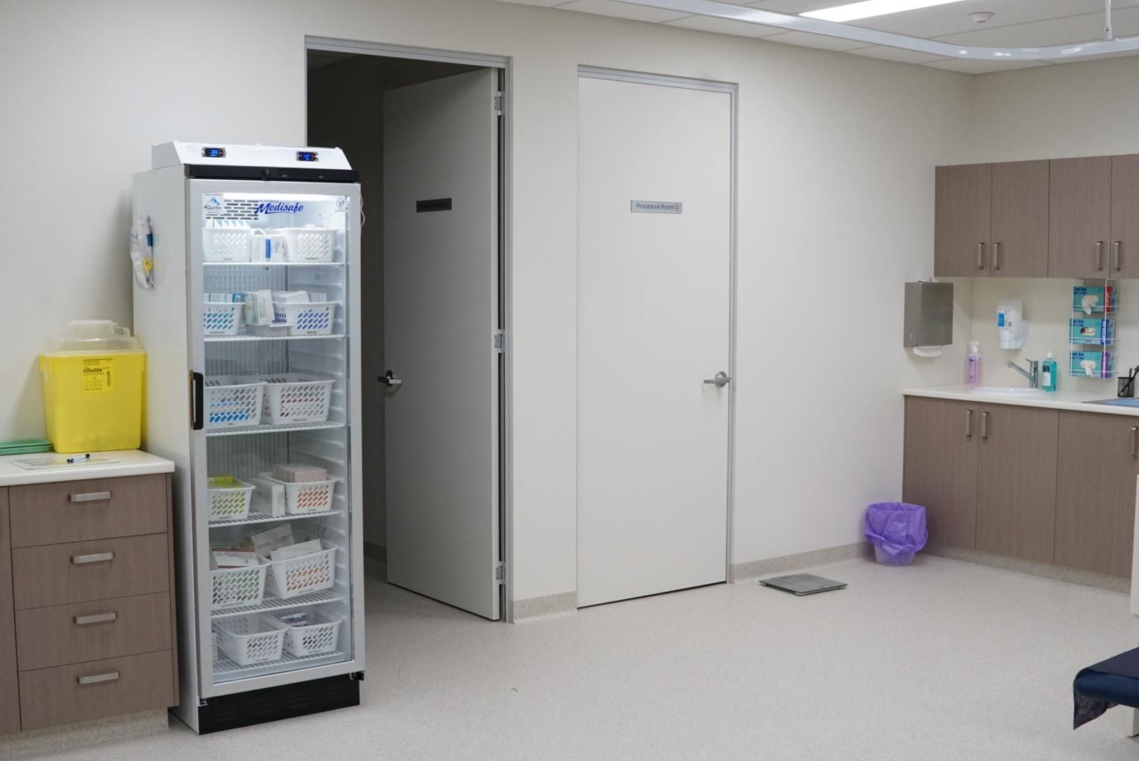 A Room With A Refrigerator And Cabinets In It — Logic Joinery In Fountaindale, NSW