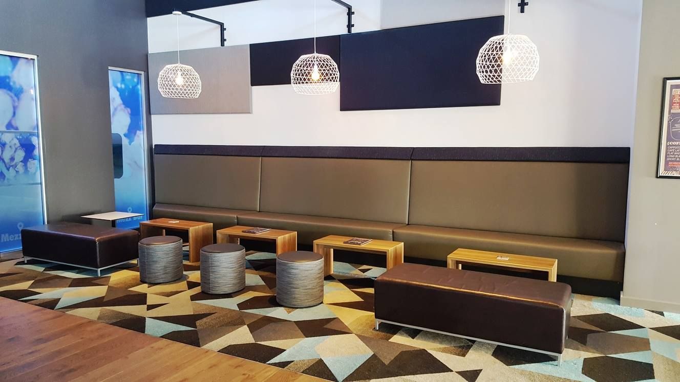 A Living Room With A Ottomans  — Logic Joinery In Fountaindale, NSW