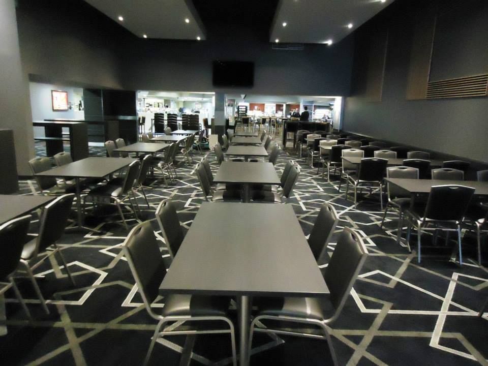 A Large Room With Tables And Chairs In It — Logic Joinery In Fountaindale, NSW
