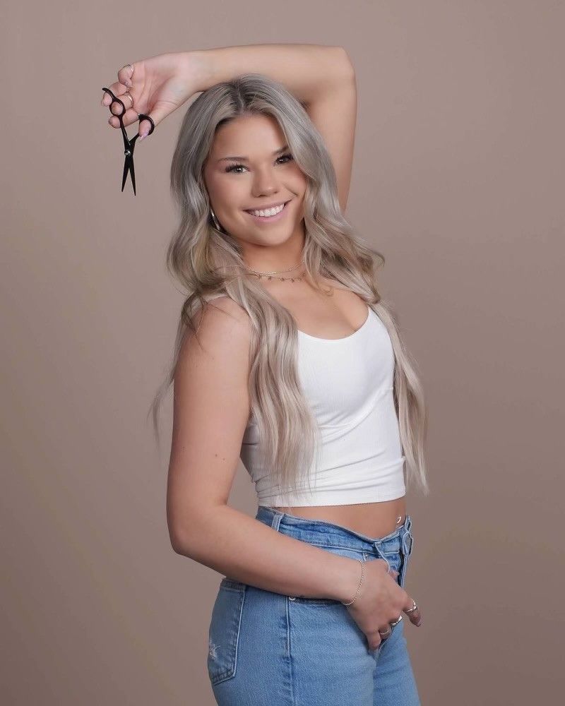 A group of women are posing for a picture together.
