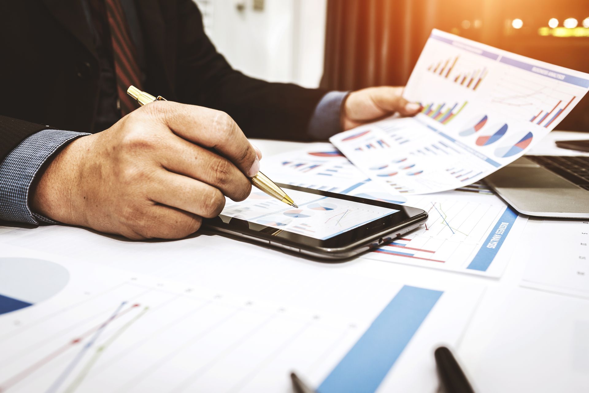 Bankers are analyzing financial data.