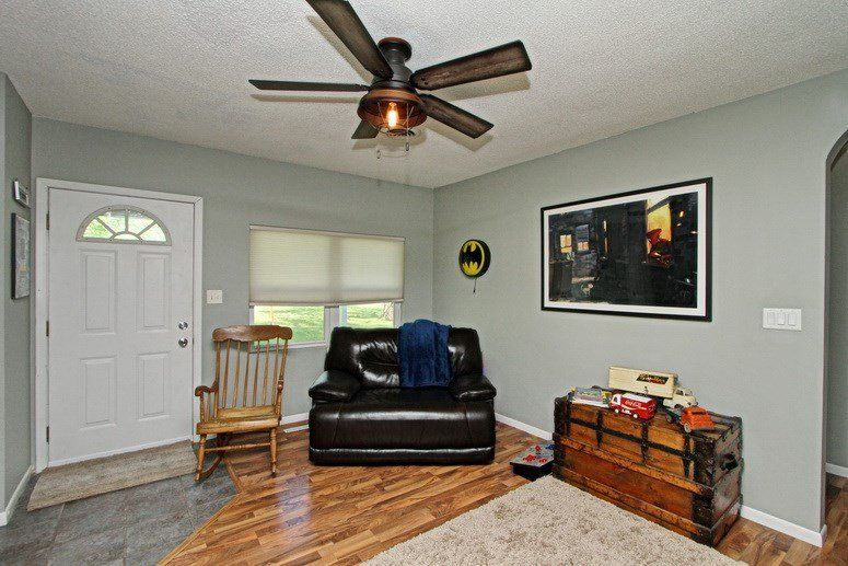 rocking chair and black sofa