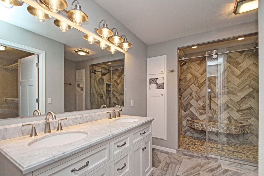 comfort room with mirror