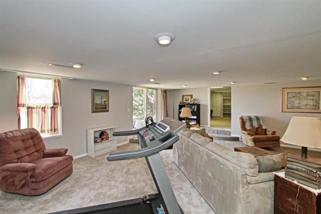 living room with gym equipment