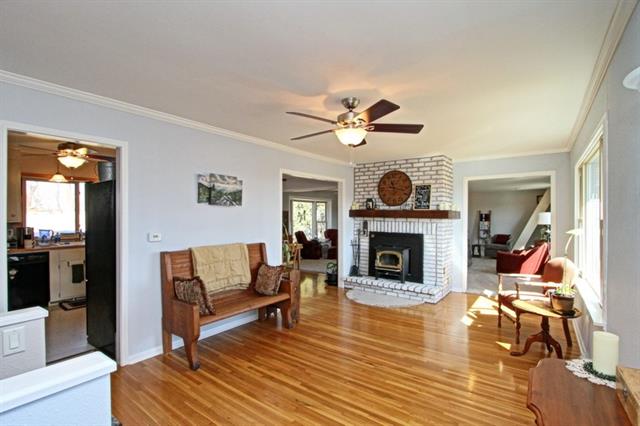 brown chair and fan