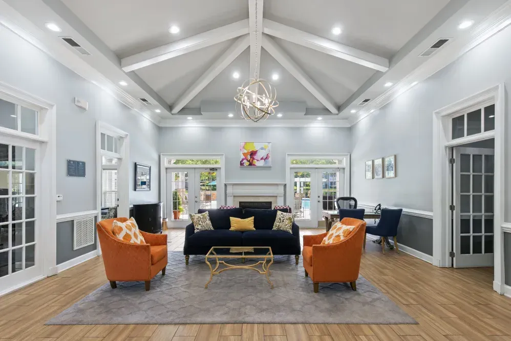 a living room filled with furniture and a fireplace at Marquis on Cary Parkway in Morrisville, NC.