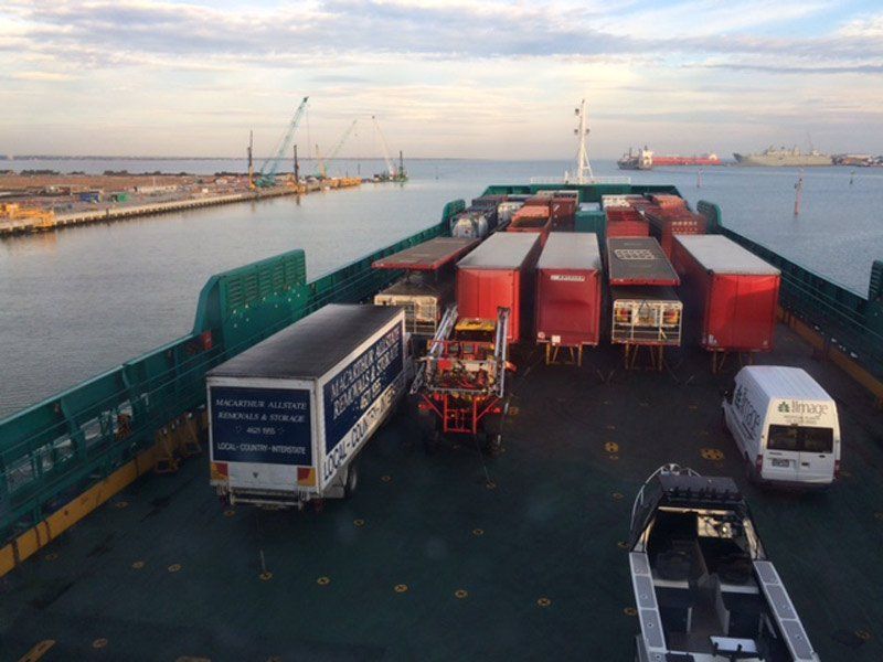 company truck on a barge