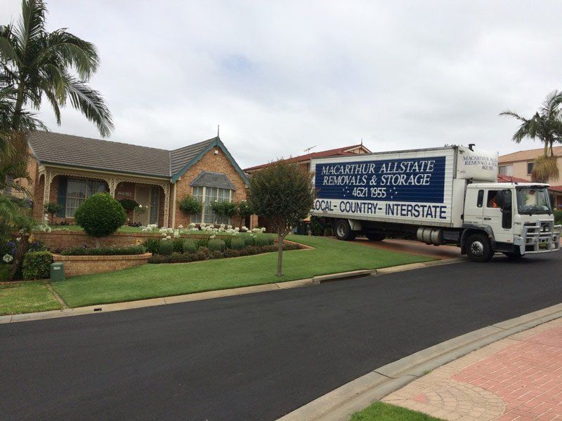 moving truck in front of house