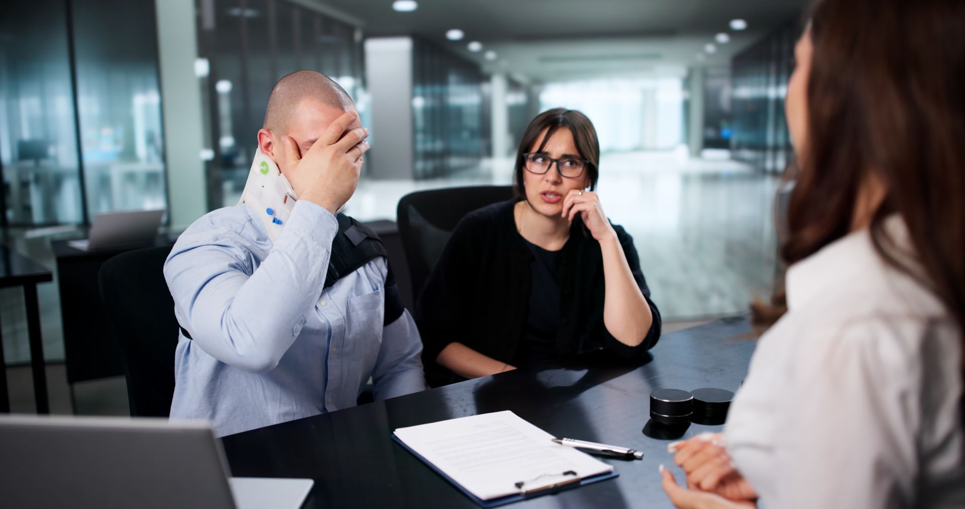 Workers' compensation attorney consultation with injured employee.