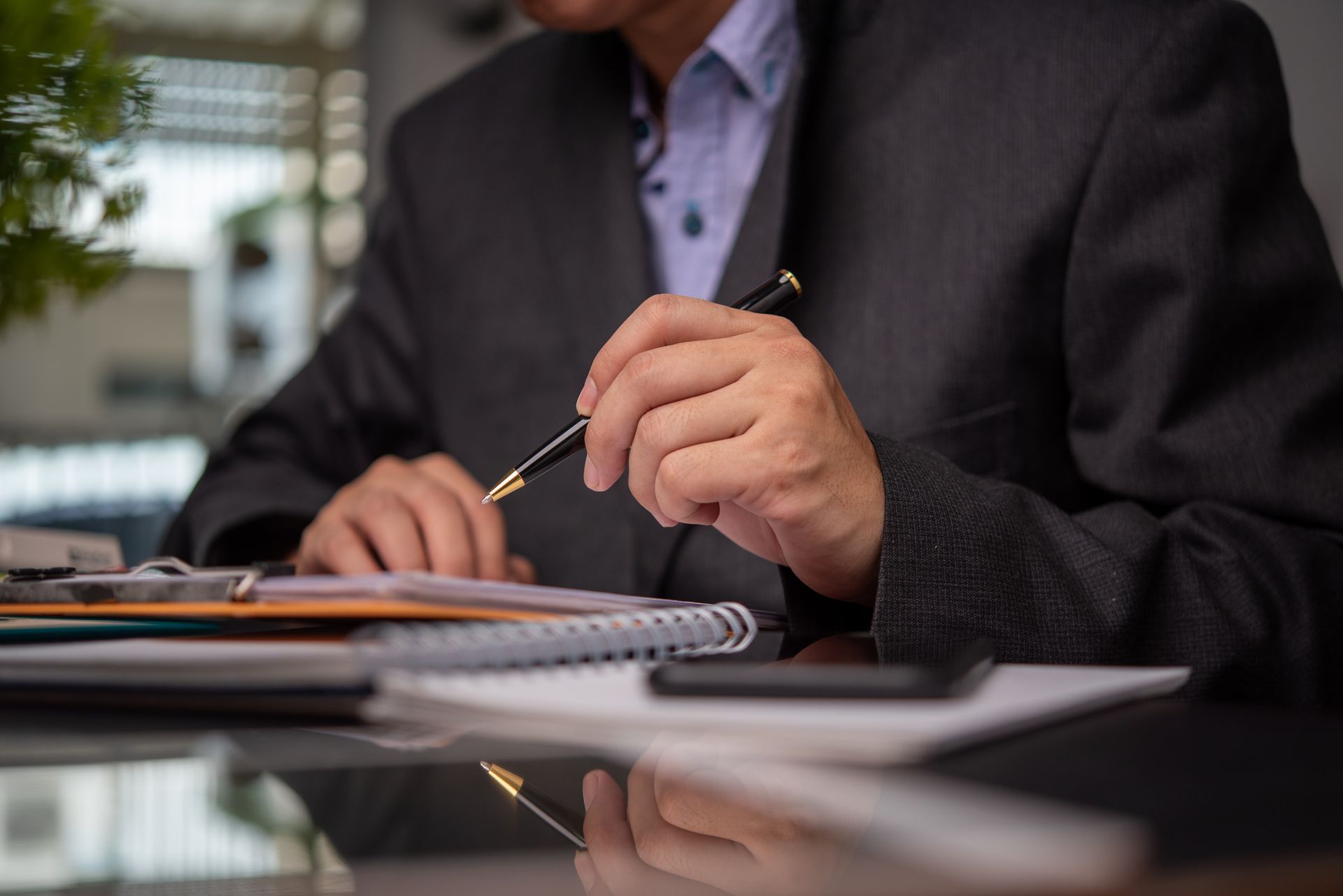 A man is going over some notes.