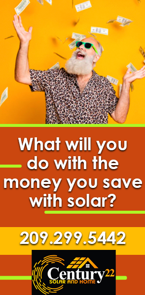 A man with a beard and sunglasses is throwing money in the air.