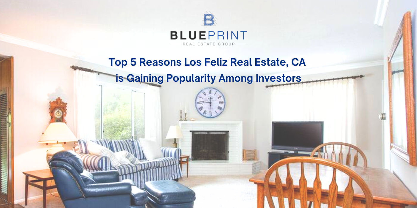 A living room with a fireplace and a clock on the wall