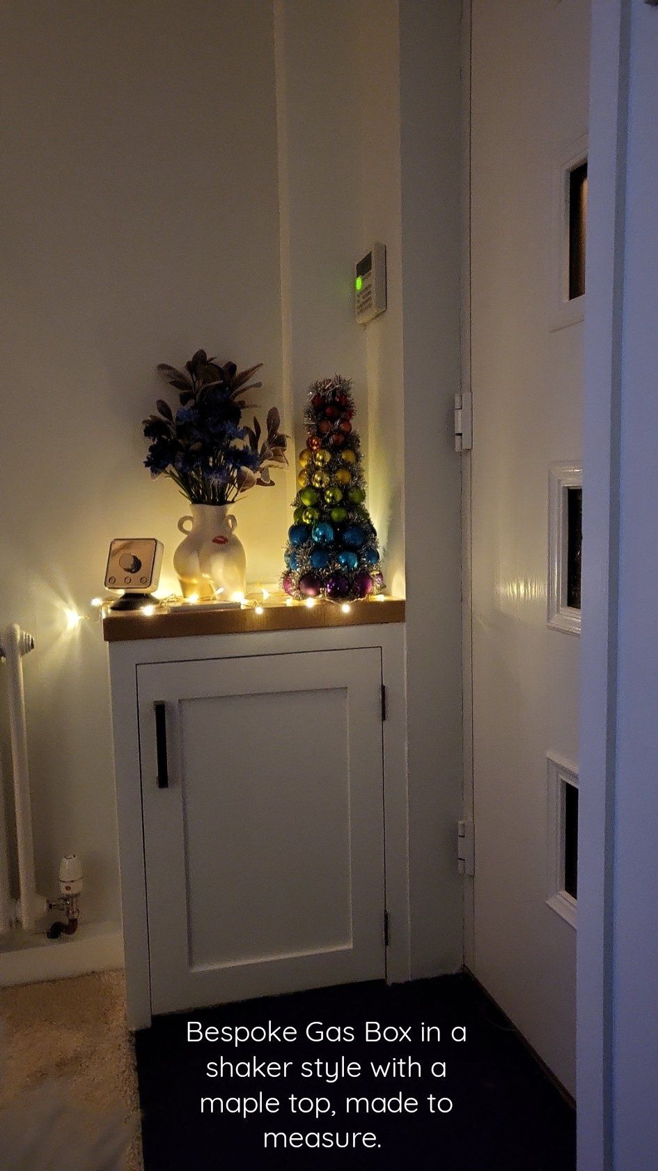 Bespoke cupboard make to measure over a gas box