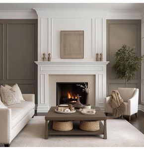 Living room with fireplace, white sofa, gray accent wall, and coffee table.