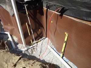 A construction site with a level and a shovel