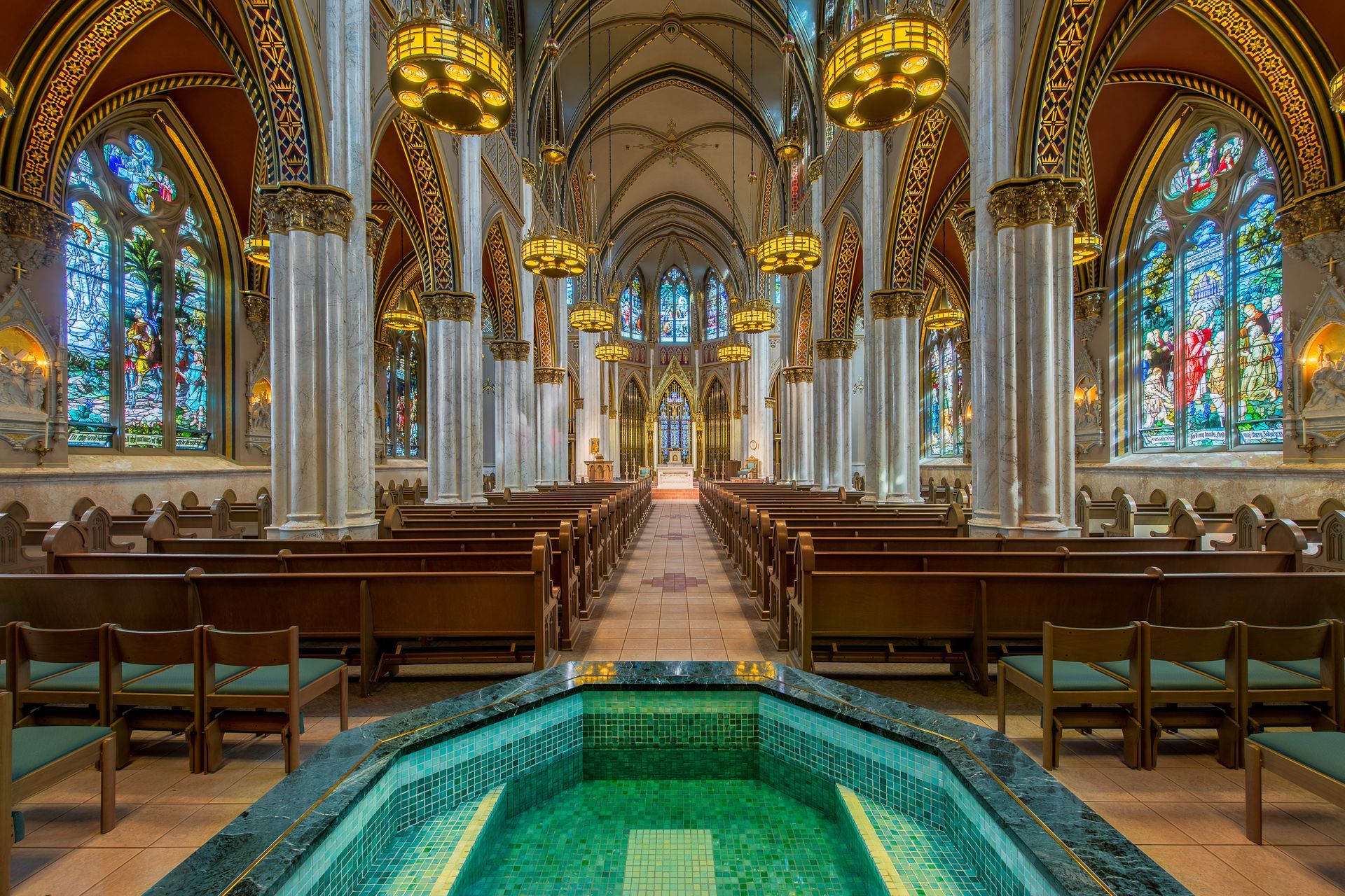 There is a baptismal font in the middle of the church.