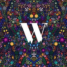 The letter w is on a colorful floral background.