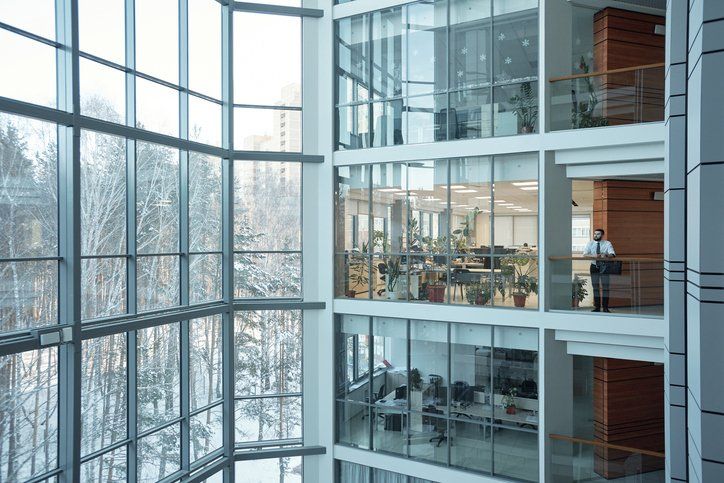 Interior of contemporary multi-floor business center with large windows in Hollywood, FL