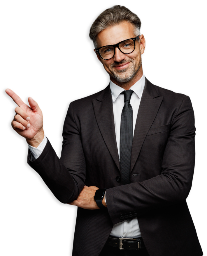 A man in a suit and tie is pointing at something.