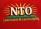 A red shirt with a nto lawncare and landscaping logo on it