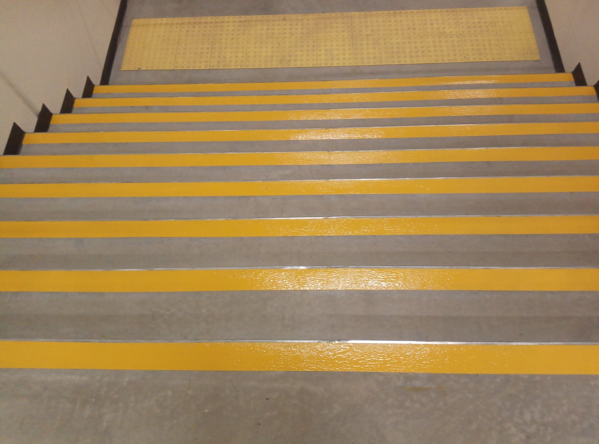 13. Completed stair nosings in safety yellow epoxy