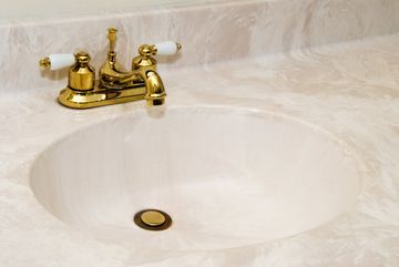Bathroom Fixtures — Cultured Marble Sink With Gold Faucet in Belmont, CA
