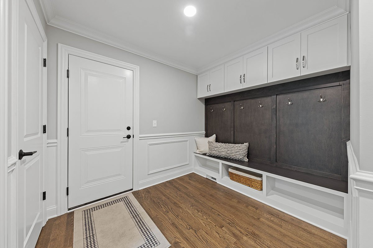 There is a bench in the middle of the room.