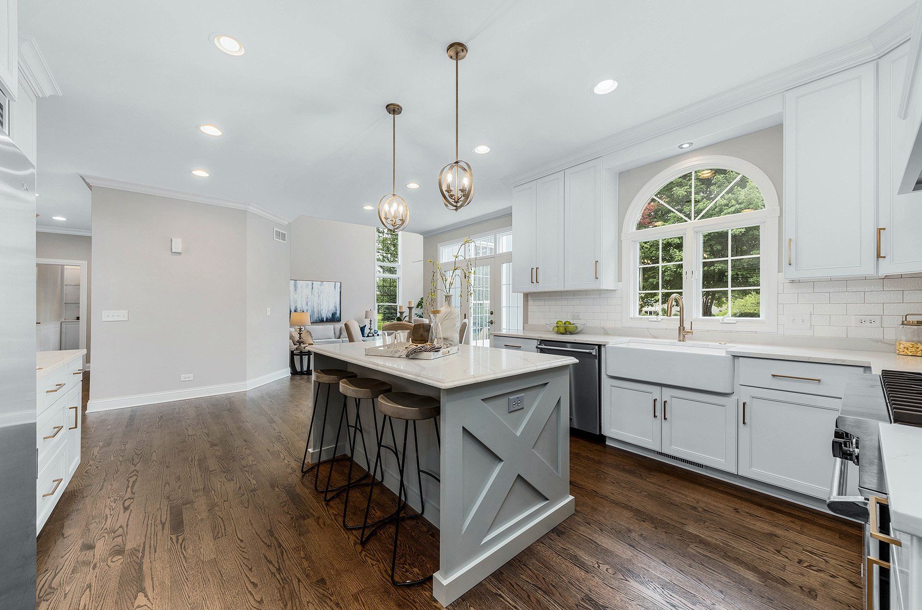 There is a large island in the middle of the kitchen.